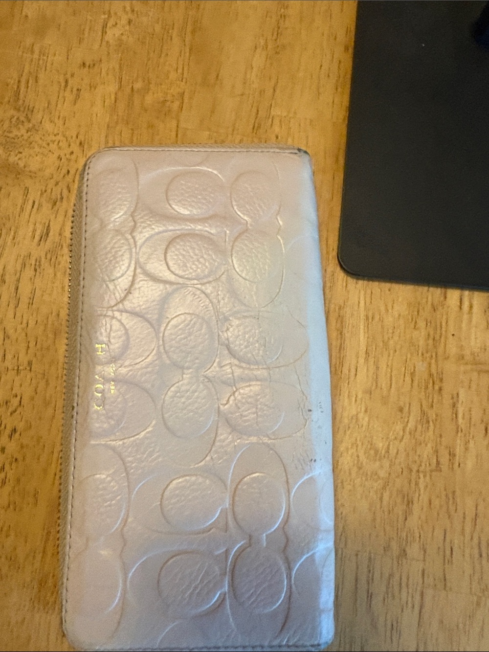 Coach Embossed Leather Zip Wallet in Light Pink